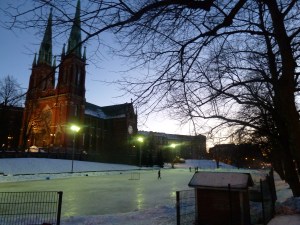 Ice hockey on a large pond outside Johannskirkko